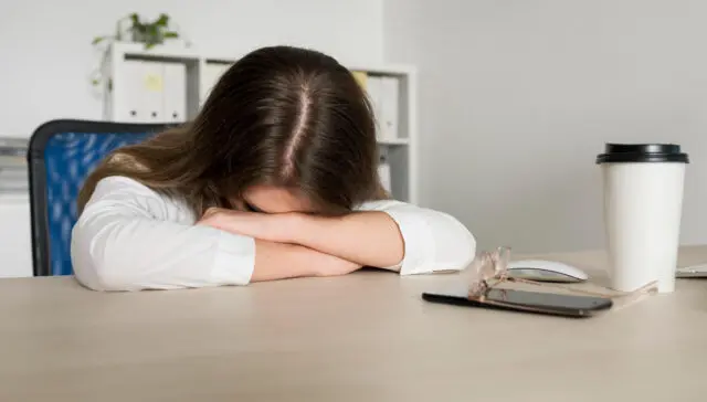 young woman sleeping work 1